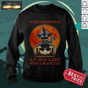 Never Underestimate An Old Lady With A Black Cat Pumpkin Sunset Halloween Sweatshirt