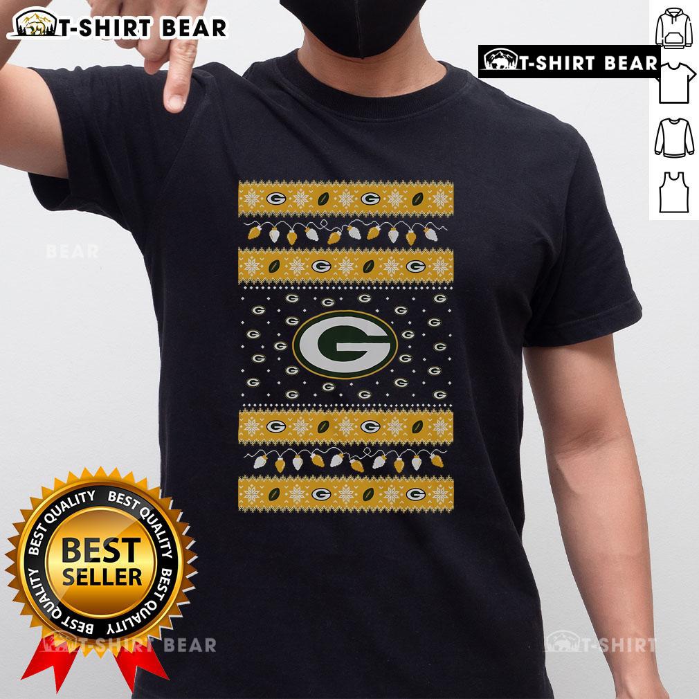 Official Green Bay Packers Holiday Christmas T-Shirt featuring festive design, perfect for fans celebrating the season.