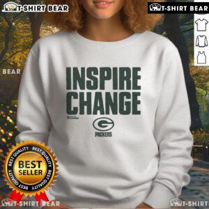 Alt Text: Official Green Bay Packers Inspire Change Sweatshirt featuring team logo and vibrant green color, perfect for fans.