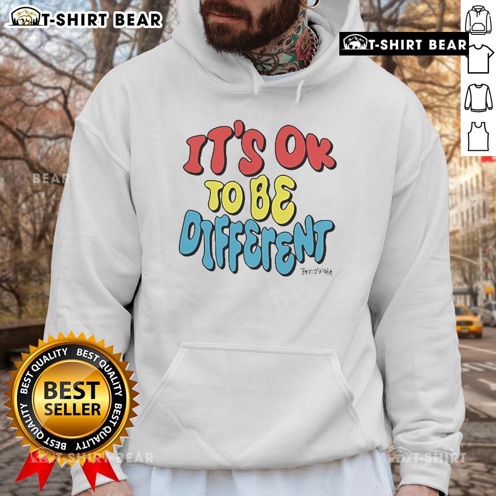 Alt Text: Tanner Smith wearing an official 'It's OK to Be Different' hoodie, promoting individuality and self-acceptance.