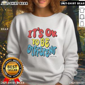 Alt Text: Tanner Smith sweatshirt featuring 'It's Ok to Be Different' message, promoting individuality and self-acceptance.