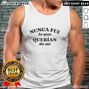 Alt Text: Official Lali wearing Nunca Fui Lo Que Queran De Mi tank top, showcasing her stylish look and unique fashion sense.