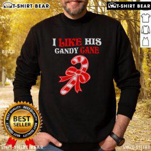 Couples wearing Premium I Like His Candy Cane Funny Christmas Sweatshirts, perfect for festive holiday celebrations.