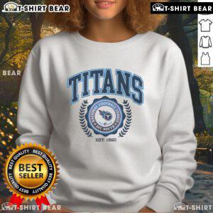 Alt Text: Premium Tennessee Titans Team Crest Est 1960 sweatshirt featuring vibrant team colors and logo for ultimate fan style.