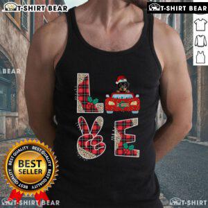 Rottweiler wearing a festive Christmas tank top for dogs, perfect for holiday celebrations and stylish pet apparel.
