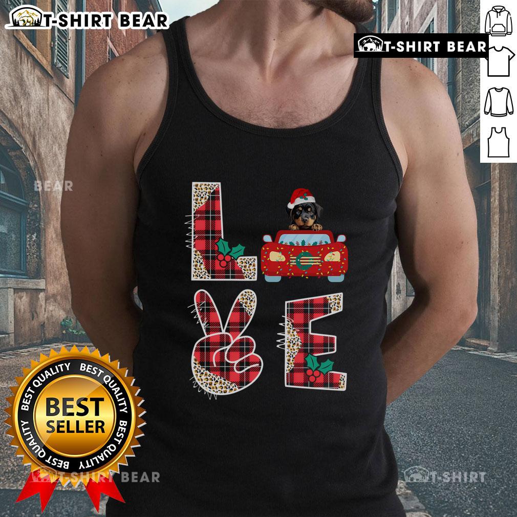 Rottweiler wearing a festive Christmas tank top for dogs, perfect for holiday celebrations and stylish pet apparel.