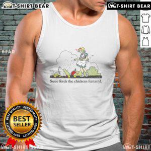 Pretty Susie wearing a Fentanyl tank top while feeding chickens in a sunny backyard setting.