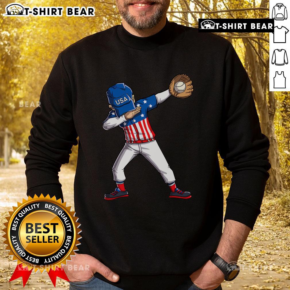 Top dabbing baseball player in USA flag sweatshirt celebrating 4th of July with patriotic style and fun.