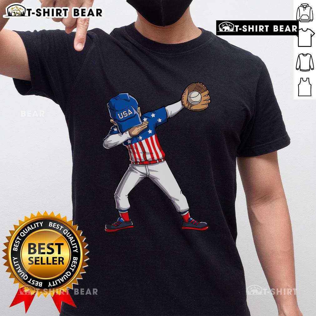 Top dabbing baseball player wearing a 4th of July USA flag T-shirt, celebrating Independence Day with style.