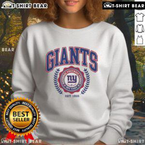 Alt Text: Top New York Giants team crest sweatshirt established 1925 showcasing the iconic logo and team colors.