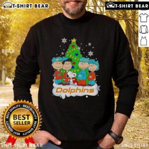 Top Peanuts characters on a Miami Dolphins Christmas tree sweatshirt, perfect for holiday cheer and sports fans.