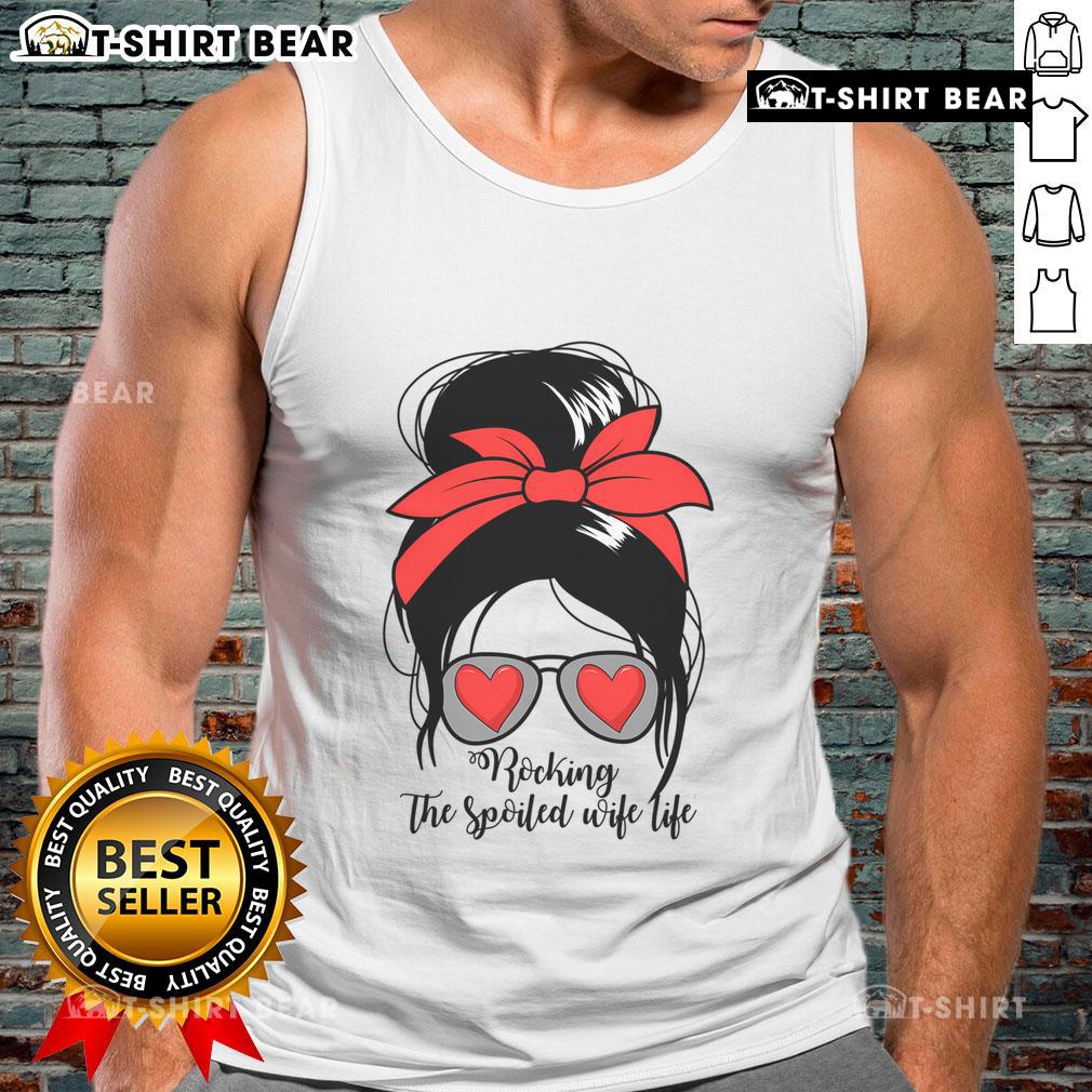 Stylish woman in a messy bun wearing a 'Spoiled Wife' tank top, embodying the awesome spoiled wife life.