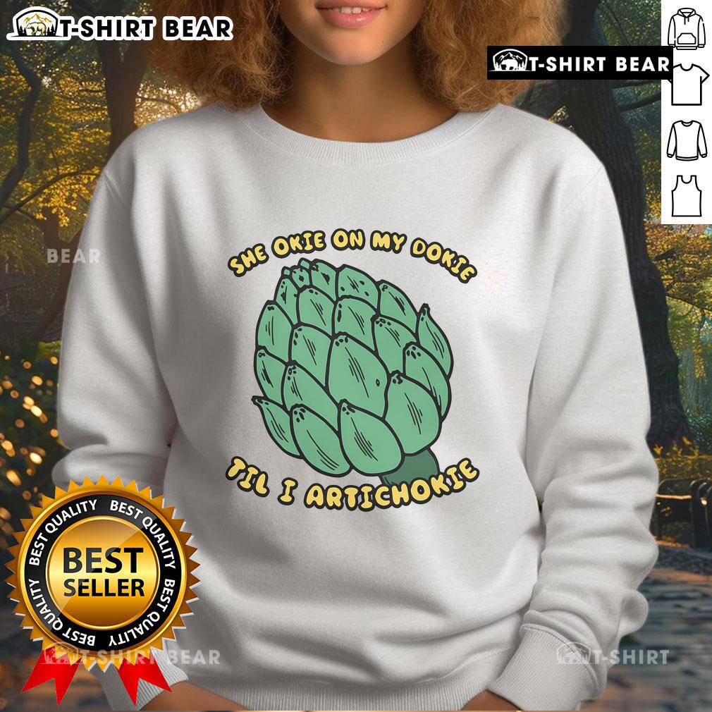 Good She Okie On My Dokie Til I Artichokie sweatshirt featuring playful text design on a cozy fabric.