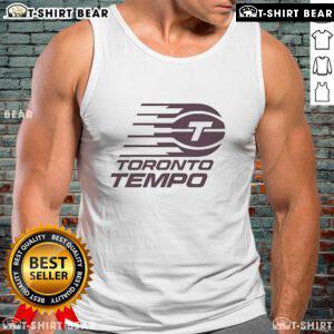 Esfandiar Baraheni wearing a Toronto Tempo tank top, showcasing vibrant design and style in urban setting.