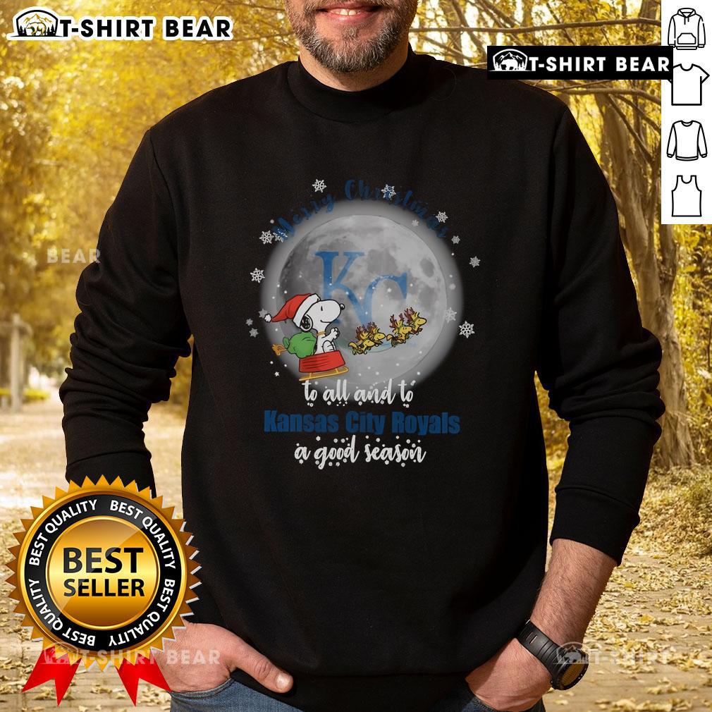 Official Santa Snoopy Merry Christmas sweatshirt celebrating the Kansas City Royals and a good season, perfect for fans.