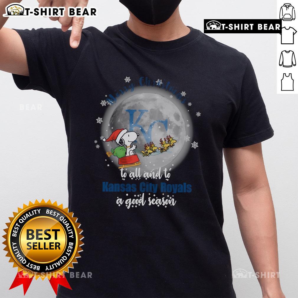Official Santa Snoopy Merry Christmas T-Shirt for Kansas City Royals fans celebrating the holiday season.