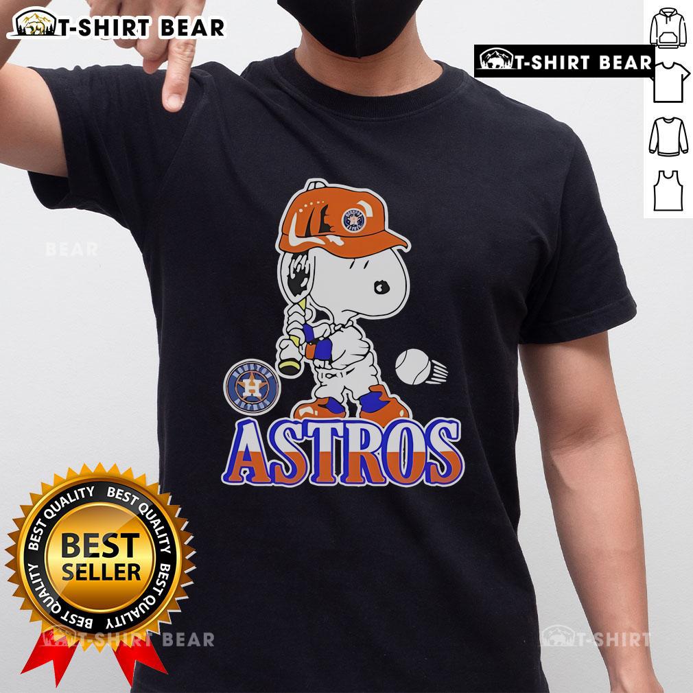 Alt Text: Official Snoopy Playing Baseball Houston Astros T-Shirt featuring Snoopy in Astros gear for baseball fans.