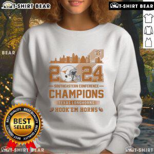 Official Texas Longhorns 2024 Southeastern Conference Champions sweatshirt featuring 'Hook 'Em Horns' design.