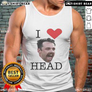 Travis Head wearing an 'I Love Head' tank top, showcasing a stylish and casual look for fans of the cricket star.