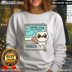 Girl in a cozy sweatshirt holding a pizza slice, showcasing Bitcoin-themed design. Fun crypto fashion moment!