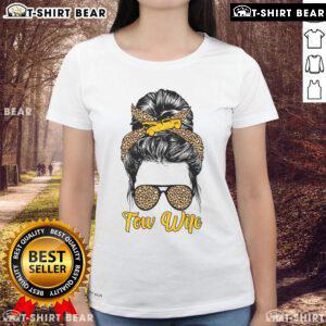 Pretty Tow Truck Wife in a cute messy bun wearing a stylish ladies tee, showcasing trucker pride and femininity.