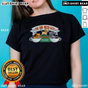 Alt Text: The One With Cats Central Purrk Ladies Tee featuring playful cat graphics, perfect for cat lovers and casual wear.