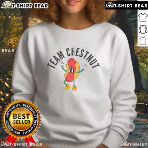 Team Chestnut celebrates victory in the Top Bring Back Chestnut Contest, proudly wearing their matching sweatshirts.