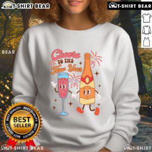 Cozy 'Top Champagne Ing Lover' sweatshirt perfect for New Year celebrations, featuring a festive cheers design.