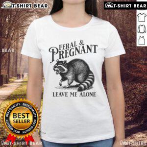 Funny raccoon graphic on a ladies tee with the text Top Feral and Pregnant, Leave Me Alone highlights humor in pregnancy.