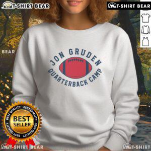 Top Gruden QB Camp sweatshirt featuring bold logo and comfortable design for football enthusiasts.