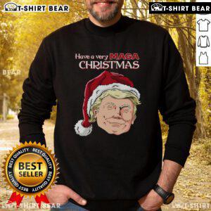 Alt Text: Top Have A Very MAGA Christmas Sweatshirt featuring festive design and bold text for holiday apparel enthusiasts.