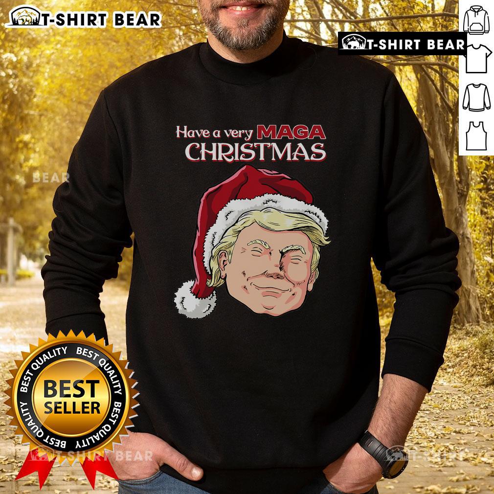 Alt Text: Top Have A Very MAGA Christmas Sweatshirt featuring festive design and bold text for holiday apparel enthusiasts.