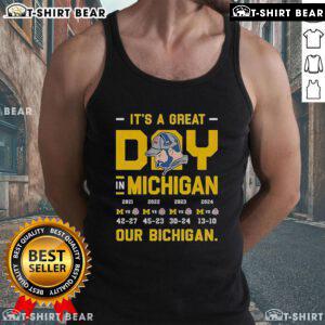 Model wearing 'Bichigan' tank top on a sunny day in Michigan, showcasing a fun and vibrant summer style.