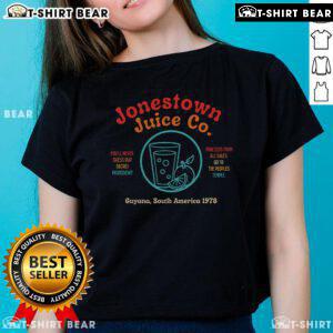 Top Jonestown Juice Co Ladies Tee featuring vibrant design and slogan 'Youll Never Guess Our Secret Ingredient.'