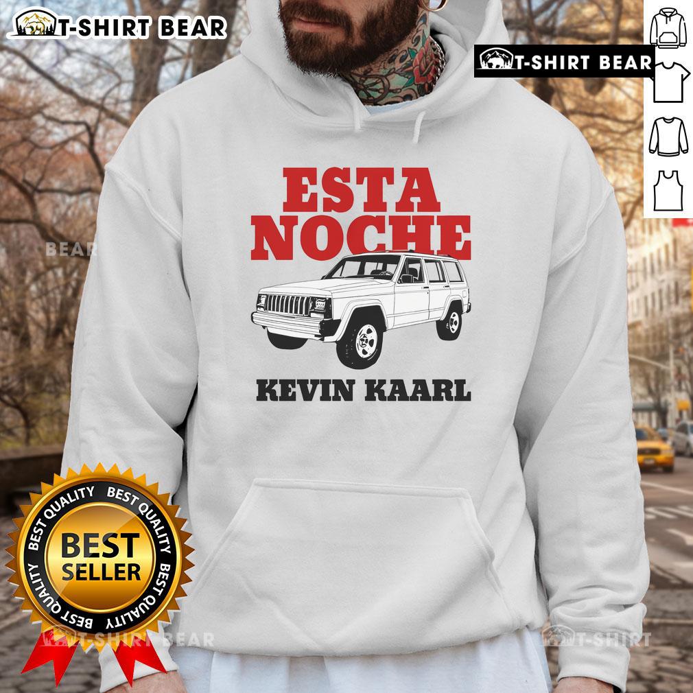 Kevin Kaarl wearing a white Ultra Sodade hoodie at Esta Noche concert, showcasing stylish streetwear fashion.