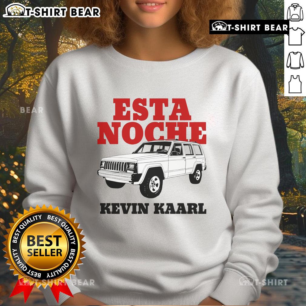 Kevin Kaarl wearing a stylish white Ultra Sodade sweatshirt during the 'Esta Noche Blanca' event, showcasing urban fashion.