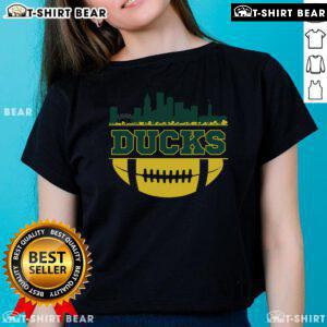 Stylish Oregon Ducks apparel featuring a city skyline design on a ladies' tee, perfect for football fans.