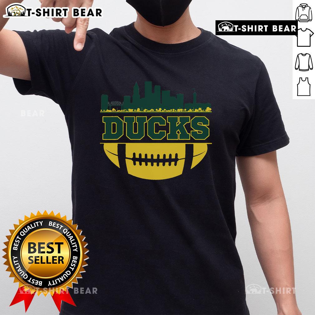 Top Oregon Ducks apparel featuring a city skyline design on a stylish football t-shirt for fans.