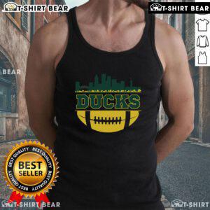 Oregon Ducks apparel featuring a city skyline design on a football tank top, perfect for fans and athletes.