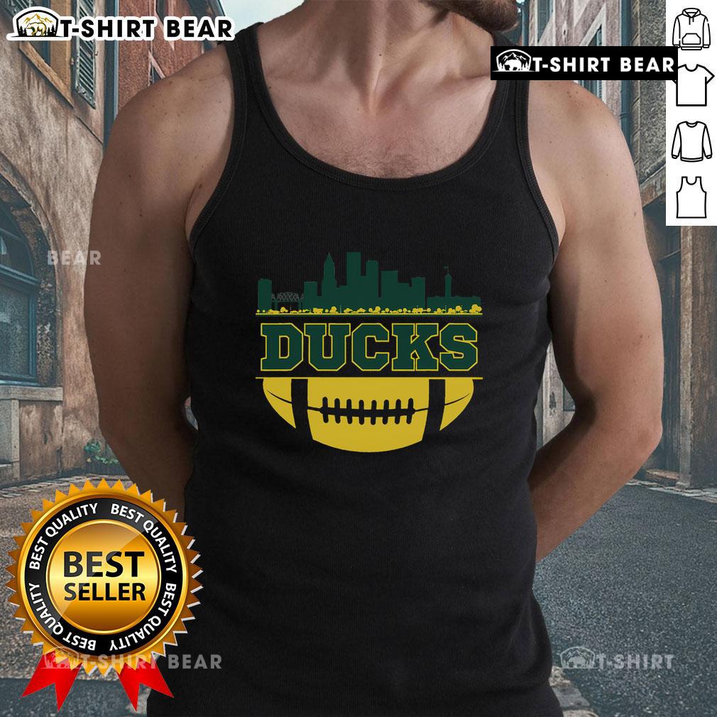Oregon Ducks apparel featuring a city skyline design on a football tank top, perfect for fans and athletes.