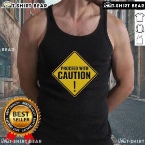 Top 'Proceed With Caution' road traffic signal graphic on a stylish tank top for safety-conscious fashion enthusiasts.