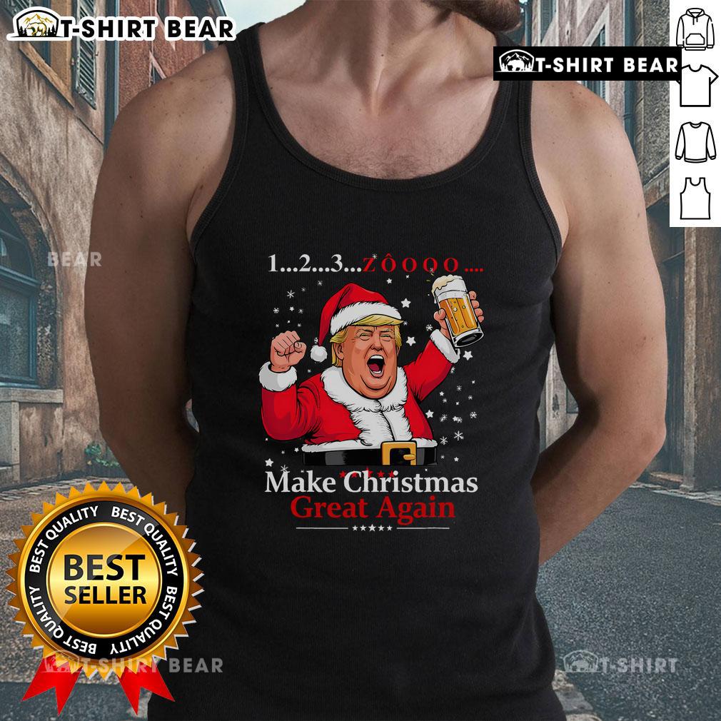Funny Trump-themed tank top at a Vietnamese Christmas party, showcasing beer and festive cheer.