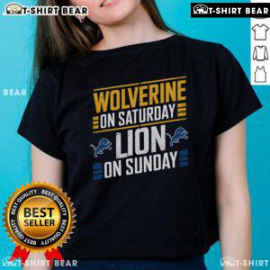 Top Wolverine on Saturday, Lion on Sunday ladies tee featuring vibrant graphics and comfortable fit for casual wear.