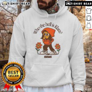 Nice Ishan Who The Hell Is Klara hoodie displayed on a wooden hanger against a minimalist backdrop, showcasing trendy design.