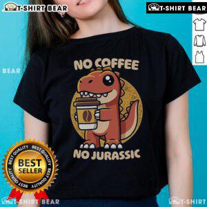 Womens 'No Coffee No Jurassic' tee featuring playful dinosaur graphics, perfect for coffee lovers and Jurassic Park fans.