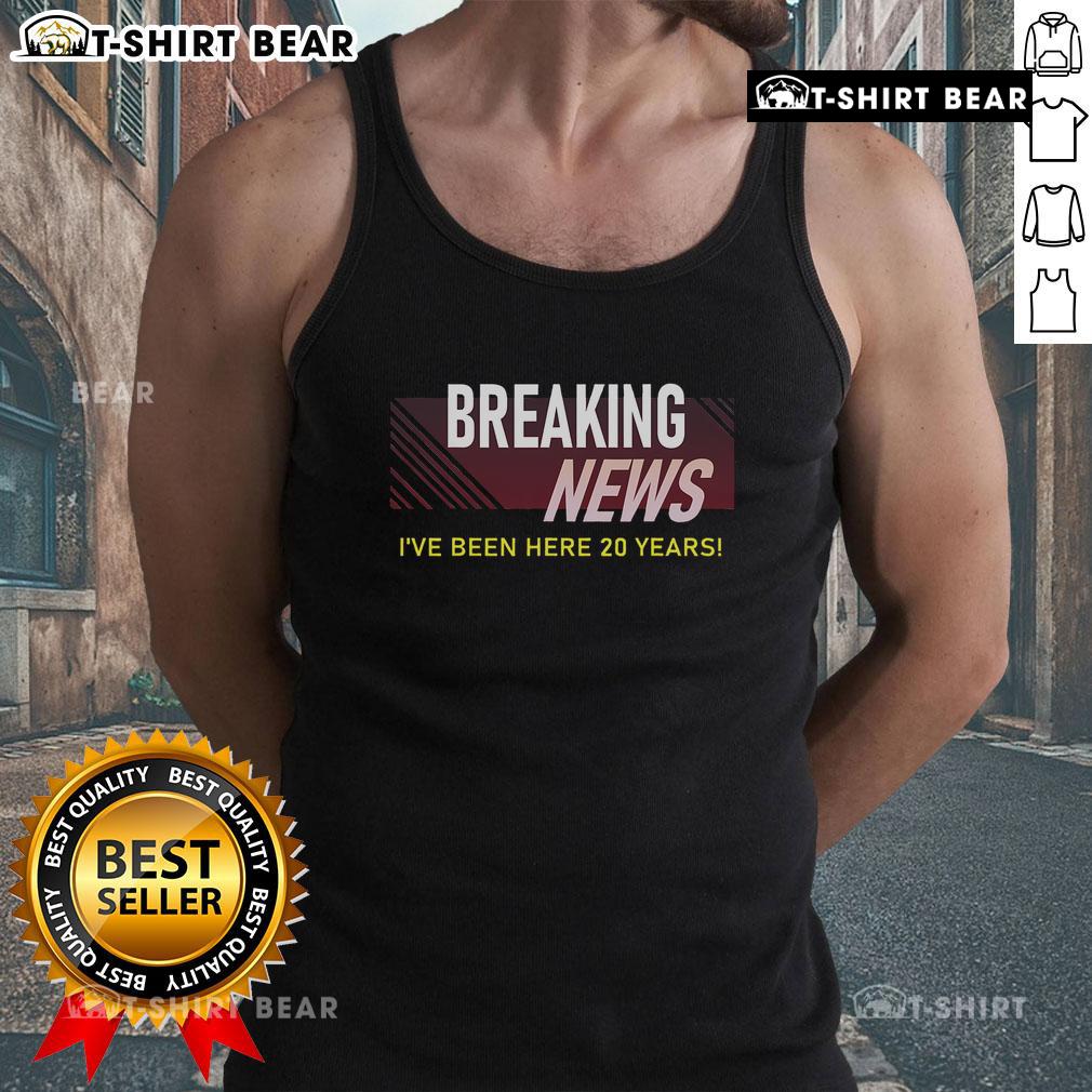Employee wearing a tank top celebrating 20-year work anniversary with '20th Employee Appreciation' design.