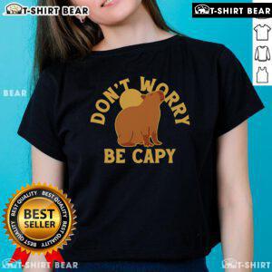 Premium Don't Worry Be Capy Ladies Tee featuring a cute capybara graphic on a stylish women's shirt.