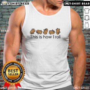 Adorable capybara wearing a cute tank top with 'This Is How I Roll' text, showcasing its charming personality.