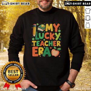 Pretty in My Lucky Teacher Era retro St. Patrick's Day sweatshirt featuring a vibrant green design and festive graphics.