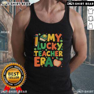 Pretty In My Lucky Teacher Era Retro St. Patrick's Day tank top in vibrant green with festive designs and playful typography.
